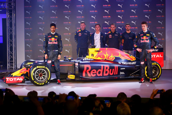 LONDON, ENGLAND - FEBRUARY 17: Daniel Ricciardo of Australia and Red Bull Racing and Daniil Kvyat of Russia and Red Bull Racing pose on stage next to the RB11 featuring the 2016 livery during the launch event for PUMA and Red Bull Racing's 2016 Livery and Teamwear at Old Truman Brewery on February 17, 2016 in London, England. (Photo by Clive Mason/Getty Images)